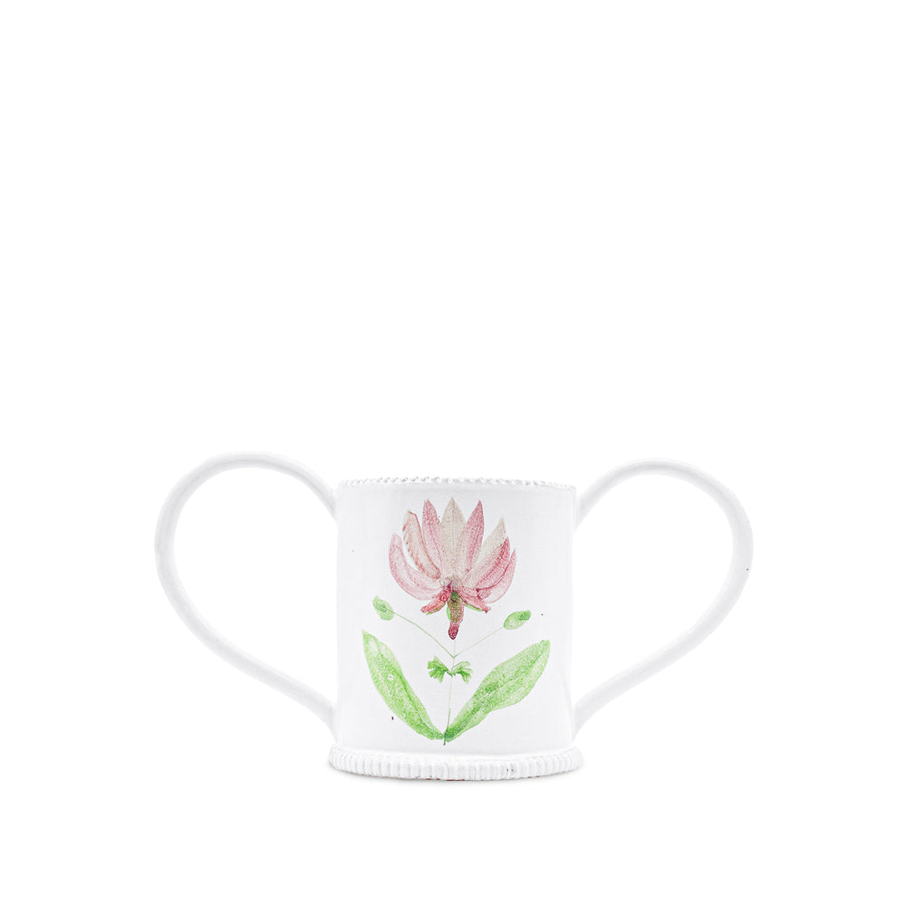 White ceramic vase with pink floral design on a white background