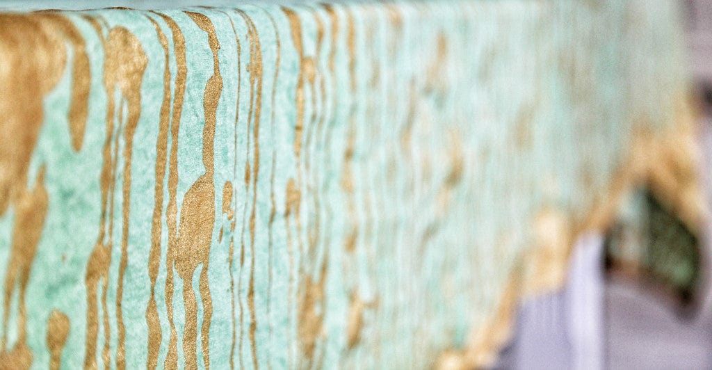 Ink Linen Tablecloth in Light Green with Gold Drips